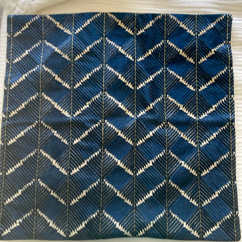 Pottery Barn accent pillow. Blue , off white herringbone pattern.